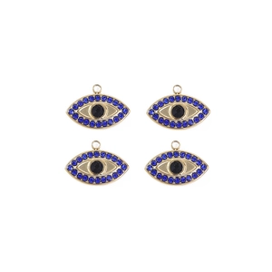 Detailed view of four gold evil eye pendants with blue rhinestones for DIY jewelry making