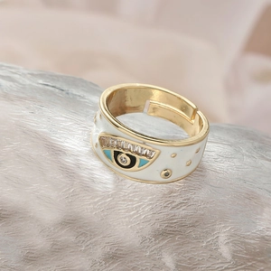Adjustable gold evil eye ring with white enamel and sparkling zircon stones for women
