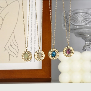 Vintage stainless steel necklaces with colorful natural stone pendants in golden finish