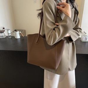 Brown lychee leather tote bag for women with minimalist fashion trend soulful lettering