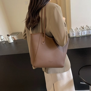 Brown lychee leather large tote bag for women with minimalist shoulder strap style