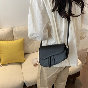 Classic black matte leather saddle bag for women with adjustable shoulder strap