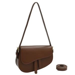Retro dark brown saddle shoulder bag with dual straps and polished gold hardware