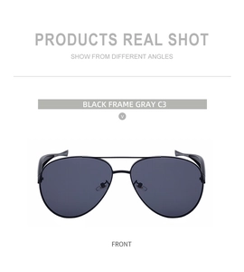 Front view of black aviator sunglasses with metal frames and grey lenses on white background