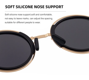 Détail des plaquettes de nez en silicone noir souple sur lunettes de soleil en métal