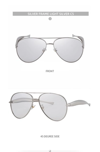 Macro view of silver metal aviator sunglasses with wide streamlined frame design