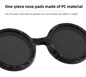 Detailed close-up of the durable PC one-piece nose pads on camouflage polarized sunglasses