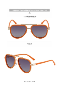 Detail view of orange pilot polarized sunglasses with gold metal bridge and gradient lenses