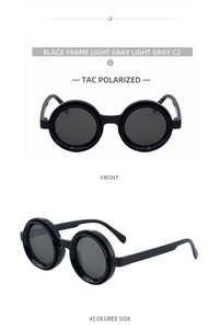 Detail of round black sunglasses with TAC polarized light gray lenses and retro frame