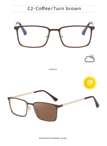 Detail of square photochromic sunglasses in coffee frame showing UV color change effect