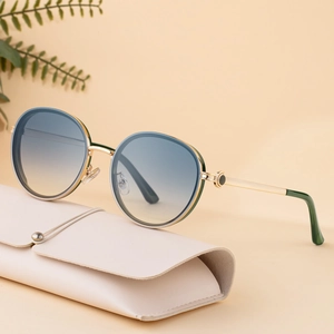 Fashionable round punk sunglasses with gradient blue lenses and gold metal temples