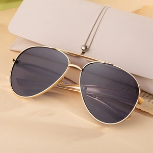 Vintage gold metal aviator sunglasses with grey lenses and white leather case