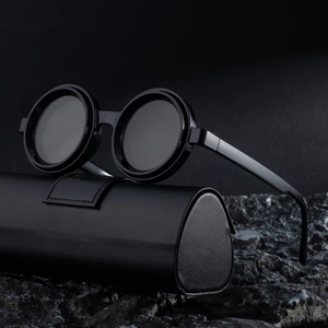 Polarized retro round sunglasses for men with a black steampunk frame and leather case