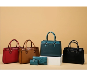 Detail view of stylish tote bags set in multiple colors with textured leather finish