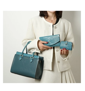 Teal tote bag set with three pieces featuring crocodile texture and gold hardware details