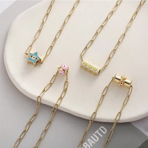 Colliers trombone dorés avec pendentifs œil du démon en émail de diverses formes géométriques
