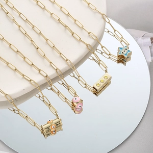 Colliers chaîne trombone dorée avec pendentifs œil maléfique et étoile en émail 3D