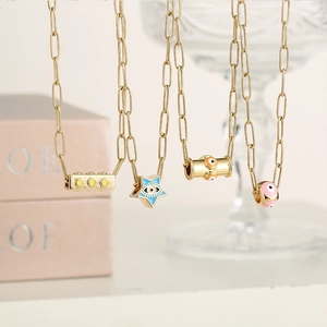 Colliers trombone dorés avec pendentifs œil du démon en émail de diverses couleurs