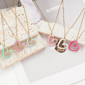 Minimalist gold-plated irregular hollow heart necklaces in six vibrant enamel colors