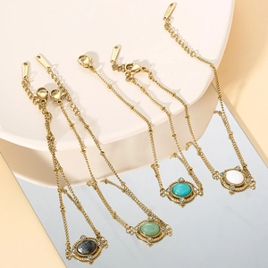 Elegant gold titanium steel bracelets set with natural stones in four vibrant colors