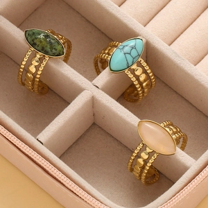Vintage bohemian stainless steel ring set with turquoise and oval gemstones in gold