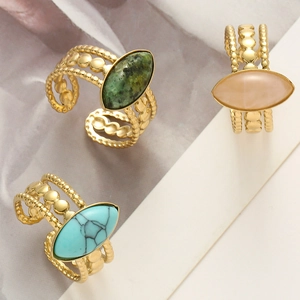Vintage bohemian stainless steel ring set with marquise turquoise stones and filigree band