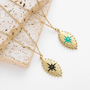 French vintage stainless steel necklace with gold starburst leaf pendant in black and blue