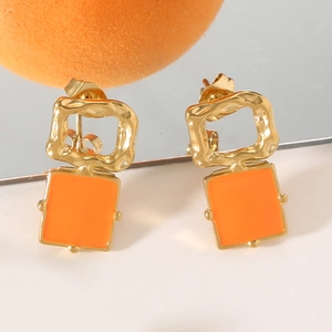 Retro geometric square earrings with orange enamel and gold hammered texture