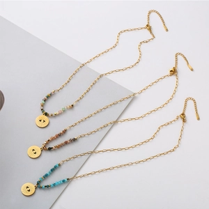 Bohemian stainless steel necklace with colorful beads and engraved circular eye pendant