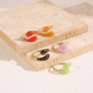 Colorful striped wrap rings in gold-plated stainless steel with vibrant enamel finish