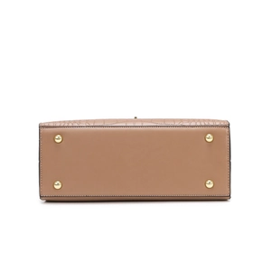 Bottom view of brown faux stone pattern handbag with protective gold metal feet studs