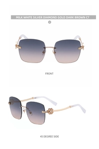 Detail of rimless clover sunglasses with diamond floral hinge and gold metal temples