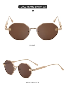 Detail of polygonal gold metal sunglasses with brown lenses and engraved temples