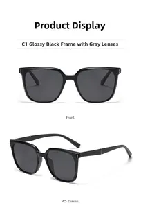 Detail of classic black square polarized sunglasses with silver metal hinges and grey lenses