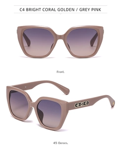 Detail view of cat eye sunglasses in coral pink with floral metal temple ornaments