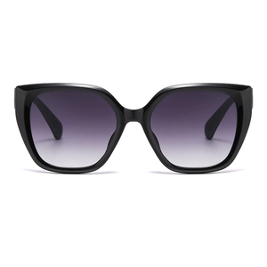 Stylish cat-eye sunglasses for women with black frames and gradient purple lenses