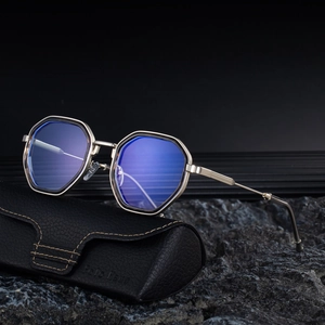 Polygonal sunglasses with metal temples and leather case on premium black stone base