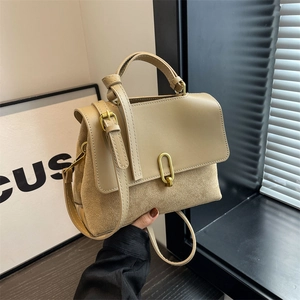 Elegant khaki contrast leather handbag with adjustable crossbody strap and gold metal lock