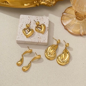 Three-piece gold-plated earring set featuring heart, drop, and leaf designs on stone
