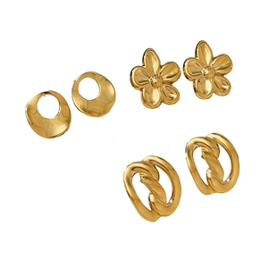 Three-piece gold titanium steel earring set with floral, ring, and textured oval designs