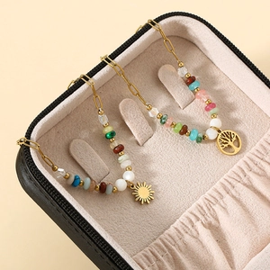 Bohemian tree of life and sun charms bracelet with colorful beads on gold chain