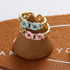 Adjustable gold Cuban chain rings with blue and pink enamel and zircon accents