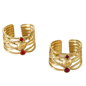 Golden woven twisted ring set with red crystal stones and spherical beads in 18k style