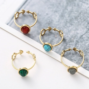 Set of four gold stainless steel adjustable rings with colorful oval natural stones