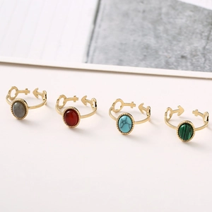 Adjustable gold stainless steel rings with oval natural stones in four vibrant colors