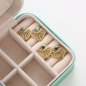 Gold fan-shaped titanium steel earrings with turquoise and malachite stones in a gift box