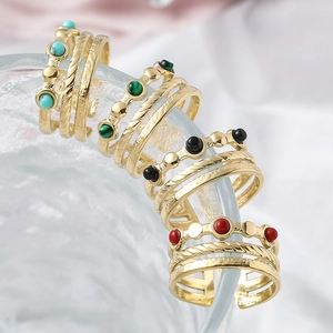 Adjustable gold layered rings set with colorful turquoise and malachite stones