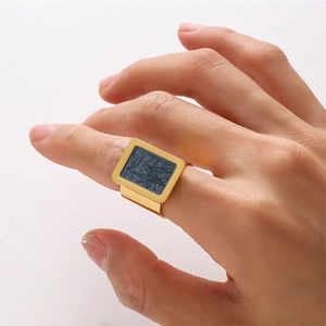 Gold rectangular signet ring with black bamboo pattern and adjustable open band design