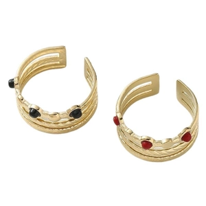 Adjustable golden layered stainless steel rings with red and black circular accents