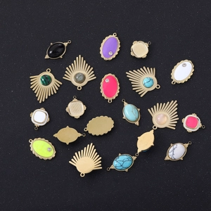 Various colorful enameled and rhinestone teardrop pendants for DIY jewelry making